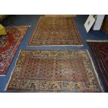 An antique North West Persian rug, the allover geometric motifs on yellow, orange,