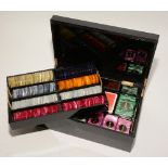 A boxed set of casino chips, comprising of denominations of 1000, 2000, 5000, 10,000, 20,000, 50,