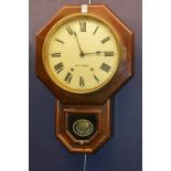 A Victorian mahogany octagonal eight day drop dial wall clock, made in USA, signed Seth Thomas,