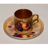 A Royal Worcester cabinet cup with saucer signed by H Everett circa 1924,