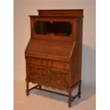 An oak bureau bookcase,