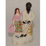 A 19th century Staffordshire flatback figure group of Eva & Uncle Tom,