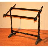 A Victorian bobbin twist tapestry stretcher,