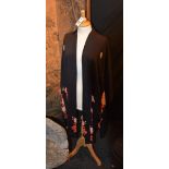 A vintage Japanese black and orange silk kimono,