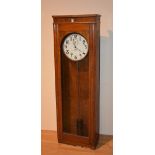 A vintage oak cased electric clock by IBM International,