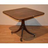 A Georgian mahogany snap top supper table, the square top with canted corners,