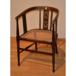 An Edwardian bow back chair, with bergere seat,