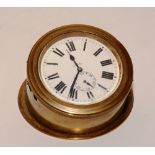 A French patent brass cased eight day desk clock, the white enamel dial with Roman numerals,