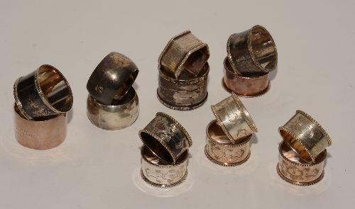 A collection of silver napkin rings, to include one pair, hallmarks for London 1912-13,