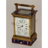 A Champleve enamel and gilt metal carriage clock,