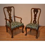 A set of eight 20th century Chippendale style walnut dining chairs,