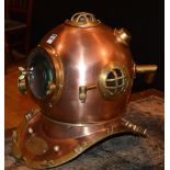 A reproduction divers helmet, with label for 'Anchor Engineering Karl Heinke Munich Germany No.