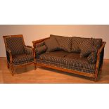 A good quality Louis XVI style beechwood two seater settee with matching armchair by Balzarotti of