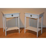 A pair of white painted modern bedside tables, with single drawer and undertier,