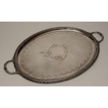 A silver plated tray, with two foliate handles,