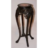 A 19th century Chinese Hongmu carved jardiniere stand, with marble top,