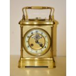 A 19th century French gilt metal mantel clock with integral aneroid barometer,