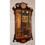 A George III style mahogany fretwork wall mirror, with satinwood inlaid shell motif to undertier,