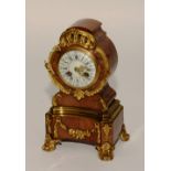 A 19th century French Louis XVI style kingwood and gilt metal mantel clock,