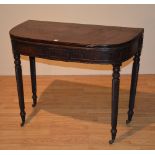 George IV mahogany fold over tea table,