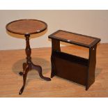 A reproduction mahogany magazine rack, with tooled leather inset to the top,