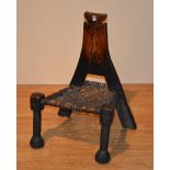 A 20th century African tribal hardwood chair, of Nigerian origin,