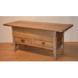 An antique pine coffer, with detachable plank top, above two small drawers, some old worm to places,