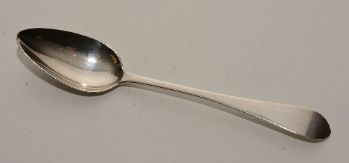 A Scottish provincial silver teaspoon, stamped with WR between two scarab beetle motifs,