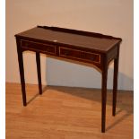 A reproduction mahogany and faux crossbanded side table, with two drawers,