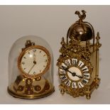 A French brass mantel clock in the form of a 17th century lantern clock,