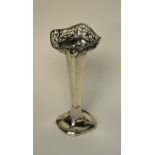 A silver posy vase, with pierced foliate top over tapering column and circular foot,