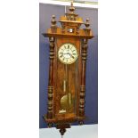 An early 20th century walnut cased Vienna wall clock by Gustav Becker,