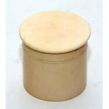 A late 19th/early 20th century ivory cylindrical box with cover and silver mount,