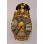 A French brass lantern clock circa 17th century,