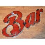 A tin bar sign, 32cm high x 57cm wide CONDITION REPORT: 570 - Tin,