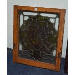 A 19th century stained leaded glass window, bearing heraldic panels and lion rampant of Scotland,