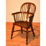 A 19th century ash and elm Windsor armchair, with pierced splat and spindle supports, moulded seat,