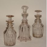 A pair of 19th century mallet shaped glass decanters, with flat mushroom head stopper, ring neck,