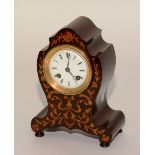 A late 19th century rosewood and satinwood inlaid lancet mantel clock, probably of French origin,
