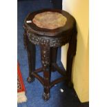 A late 19th century Chinese Hongmu occasional table, the circular top with marble inset,