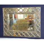 A late 19th/early 20th century Venetian wall mirror, decorated with flower roundels,