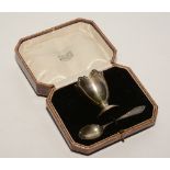 A Harrods boxed silver christening set, comprising egg cup and teaspoon,