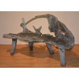 A naturalistic tree trunk garden seat,