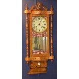 A late Victorian marquetry inlaid striking wall clock, the dial with Roman numerals,