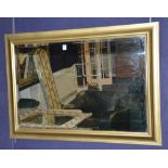 A modern gilt framed rectangular wall mirror,