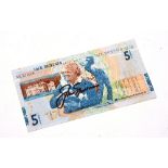 A Jack Nicklaus five pound note signed by the golfer himself,