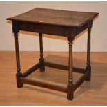 An 18th century country oak side table, with drawer to one end,