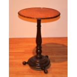 A 19th century circular wine table,