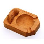 A Robert Mouseman Thompson carved oak ashtray, with mouse carving,