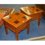 A pair of modern cherry wood two tone lamp tables, of square form,